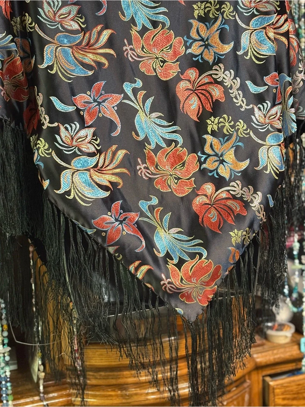black floral embroidered silk like boho shawl featuring long fringe trim